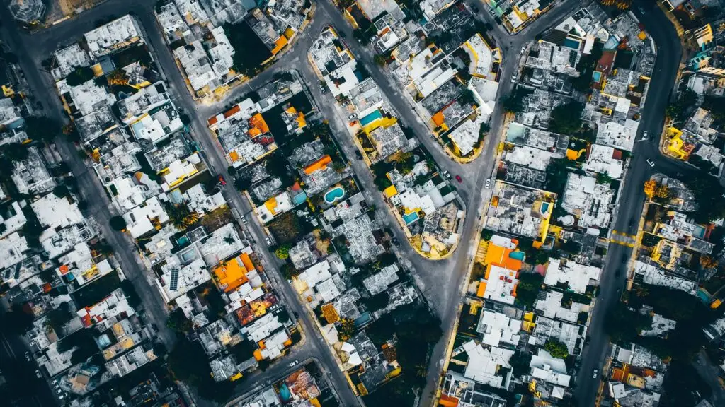 Vibrant aerial cityscape of Mérida, Mexico, showcasing urban architecture and winding streets.