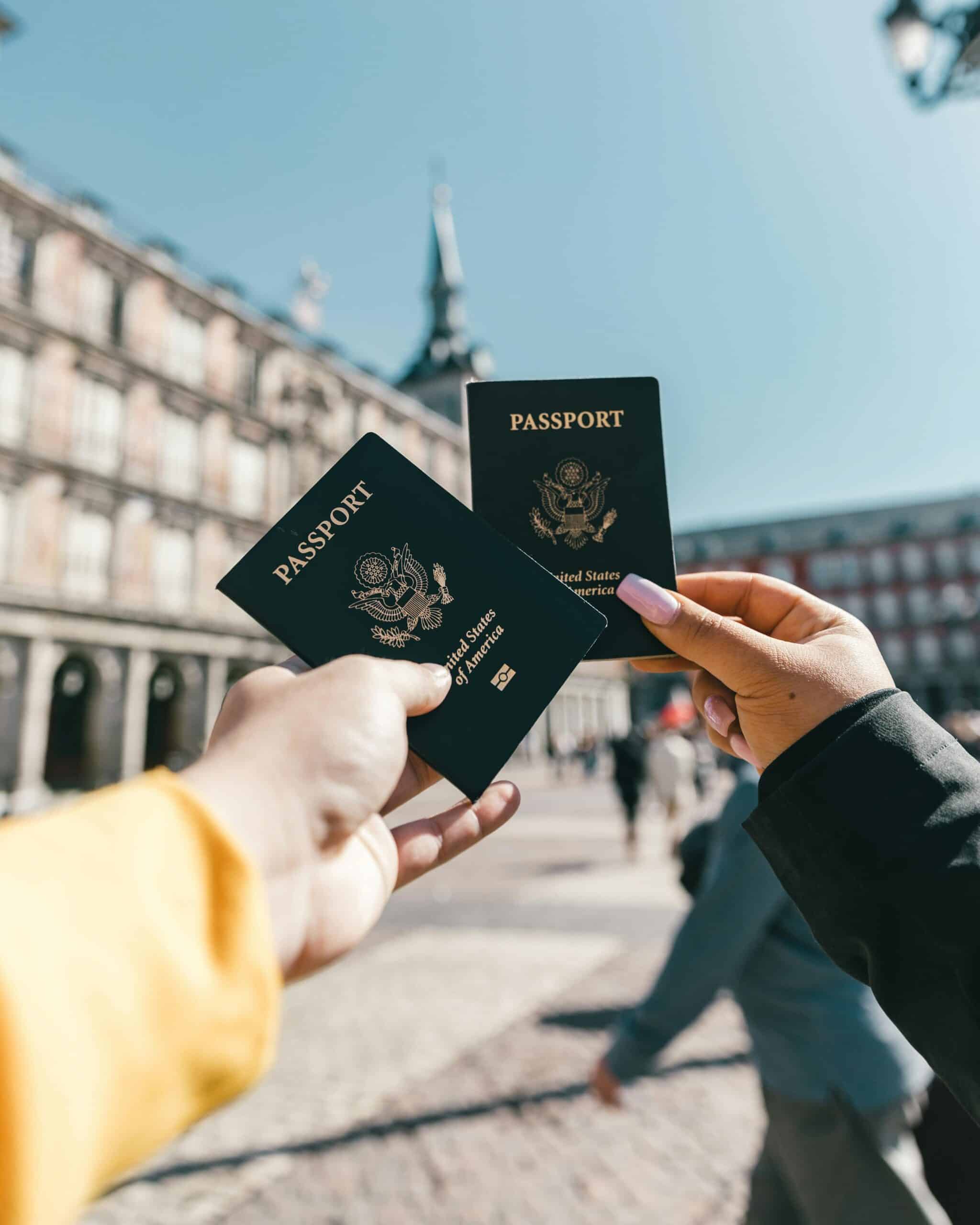 Travelers holding US passports. Understanding Residency Requirements for Expats in Yucatán